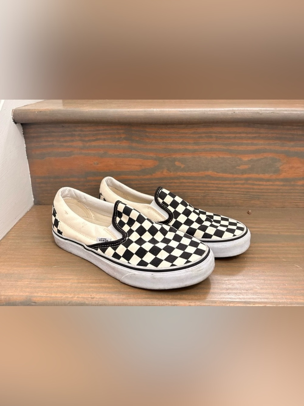 Vans Checkerboard Slip-On Sneakers in Black and White
